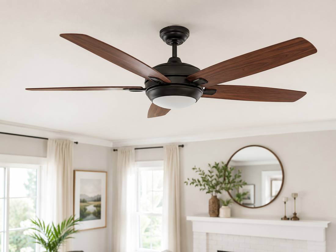 Woman cleaning wood ceiling fan blade with microfiber cloth while standing on a step ladder