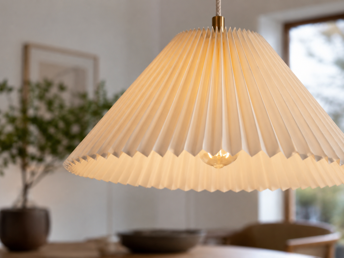Pleated pendant light over dining table — Solena Lighting