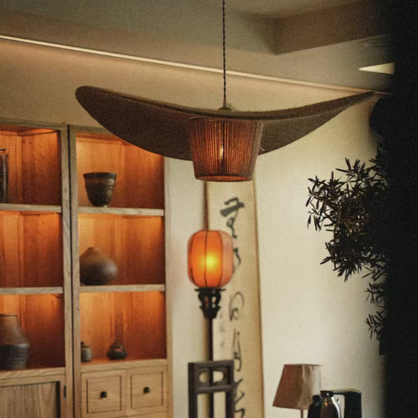 Luma beaded tiered chandelier close-up with ribbed beaded amber glass cylinder