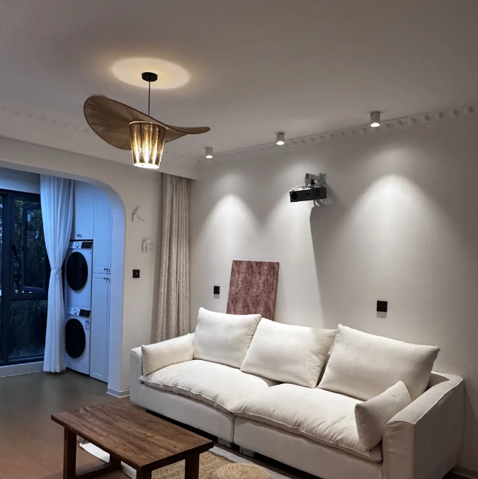 Luma beaded tiered chandelier with amber glass cylinder and broad wood disc shade