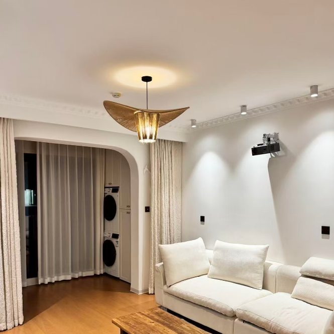 Luma beaded tiered chandelier with centered amber glow under wide wood fan canopy