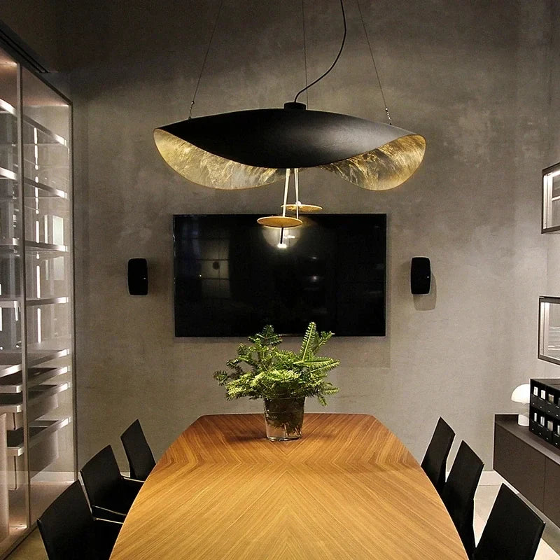 Black and gold foil pendant light with wide disc shade and small central hanging lamp