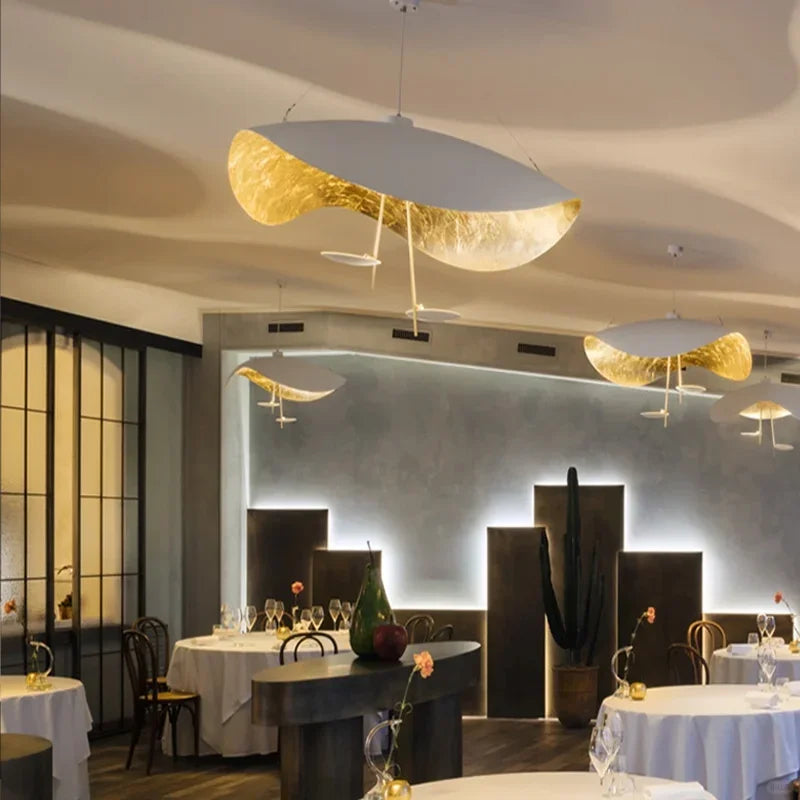 Gold and black foil disc pendant light, multiple hanging shades