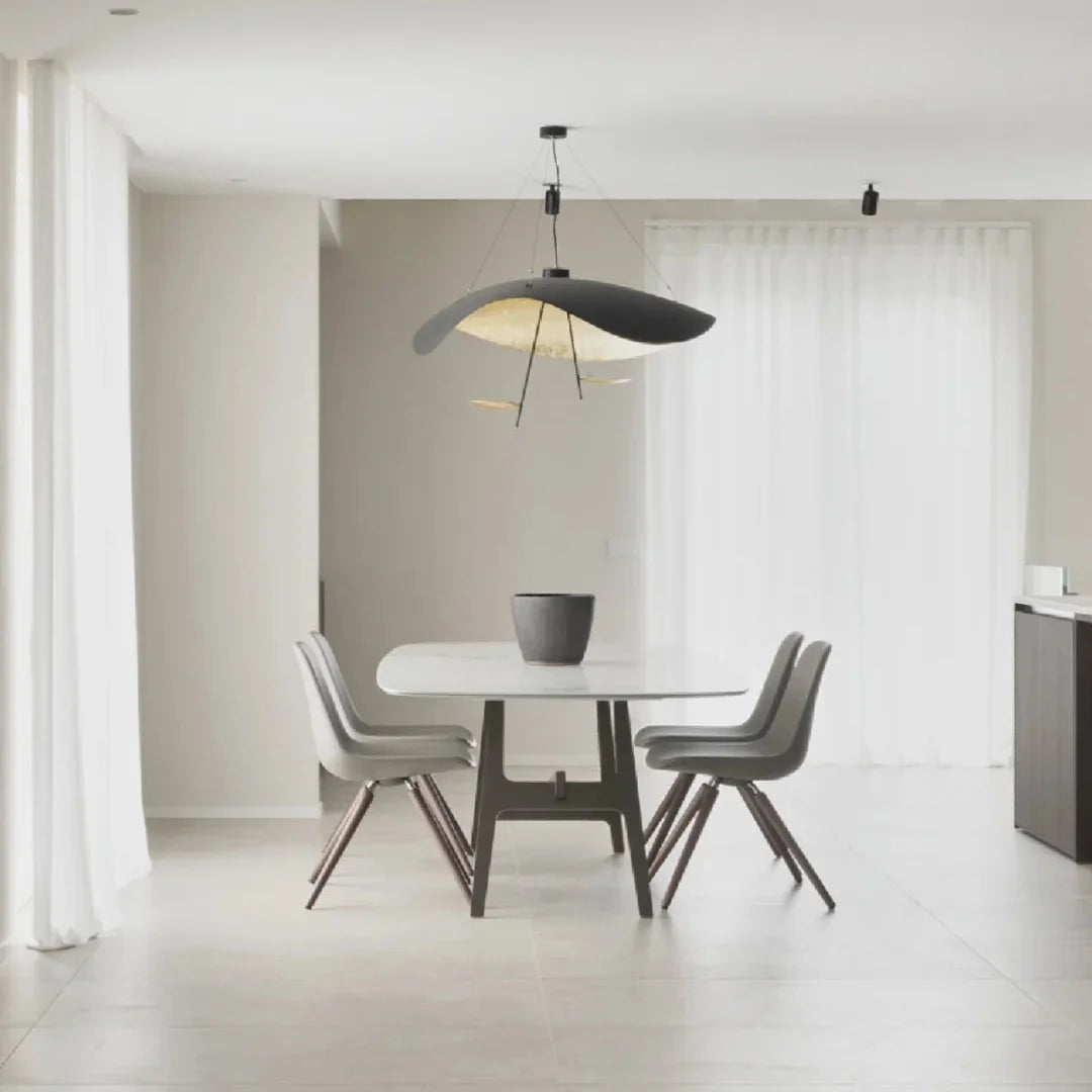 Black and gold foil disc pendant light with hanging cord and minimal frame