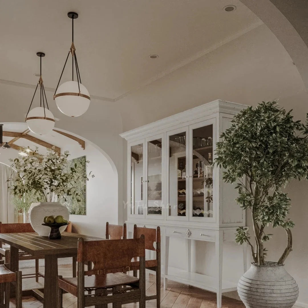 Glass globe pendant light set with round white shades and black hanging stems