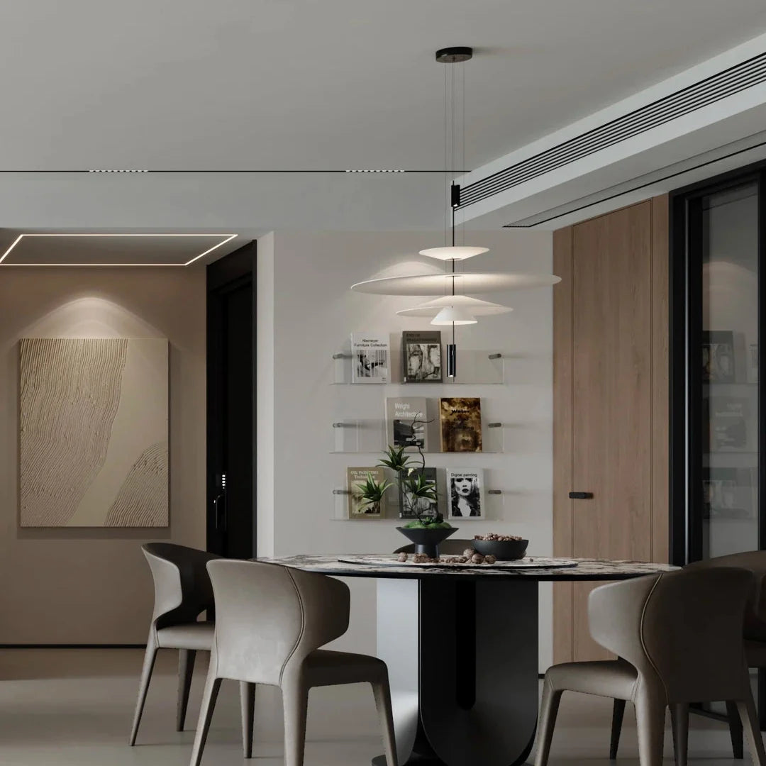 Stacked disc pendant chandelier with white shades suspended from black stems
