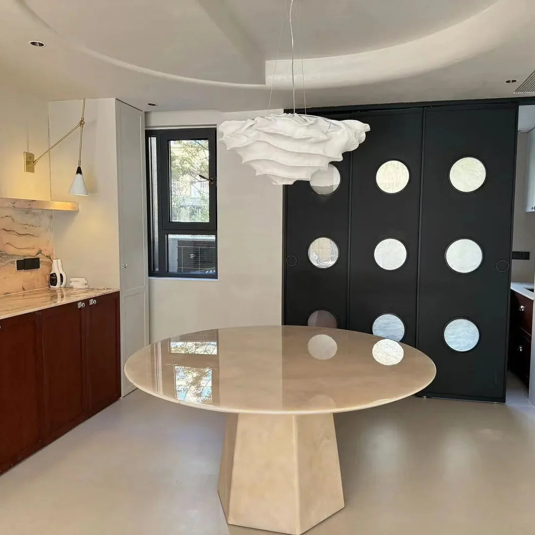 Cloud-shaped pendant light with smooth white sculpted cloud diffuser shade