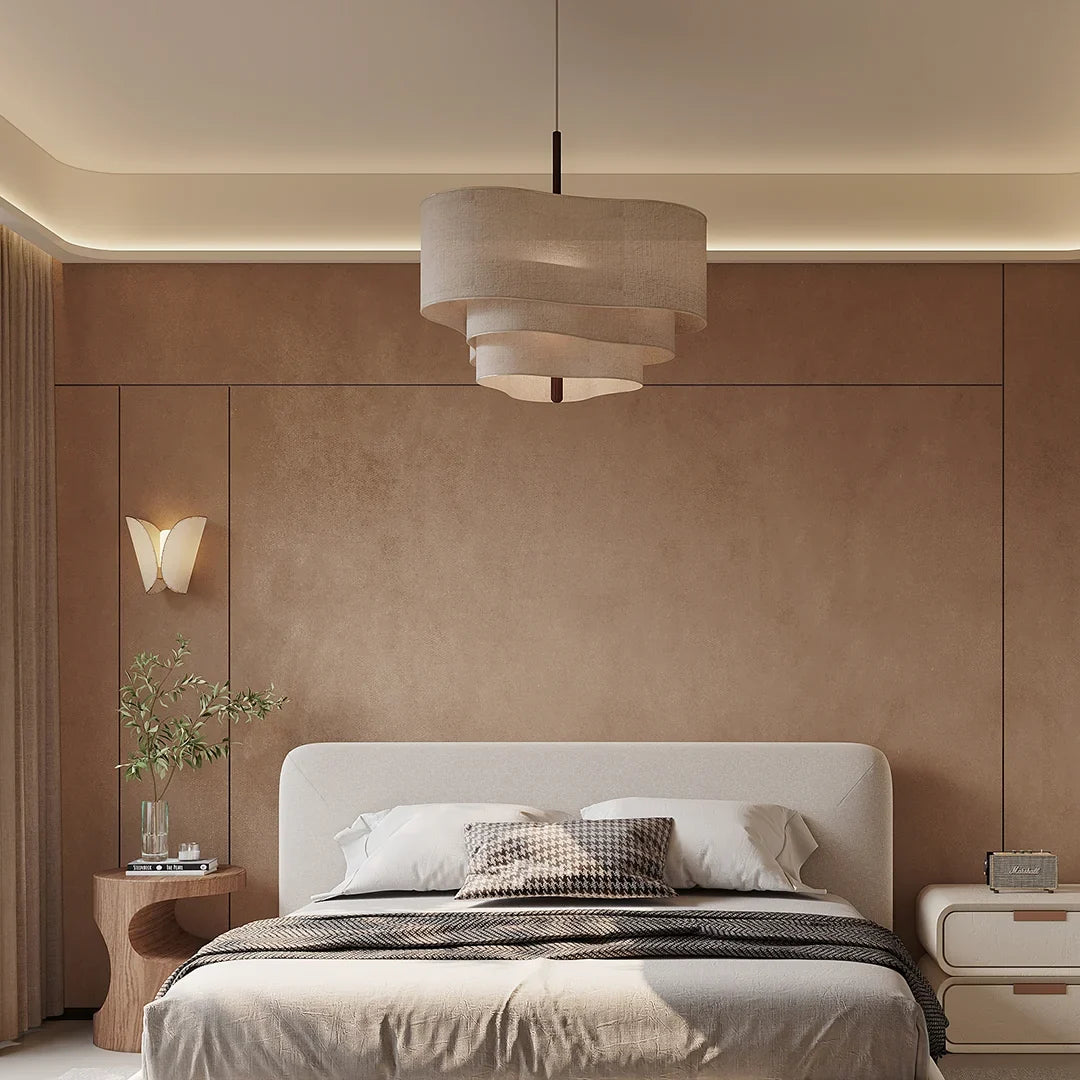 Beige linen layered pendant light with two stacked drum shade sections
