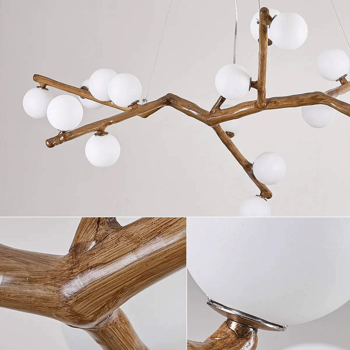 Detail of branch chandelier arms with glossy finish and round white globe bulbs