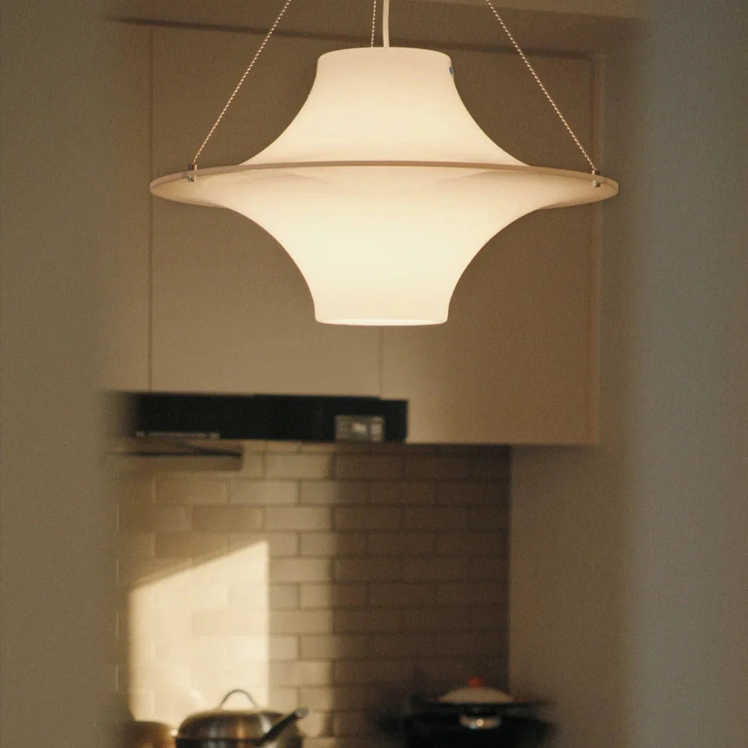 White disc pendant light with layered shade shape and hanging cords