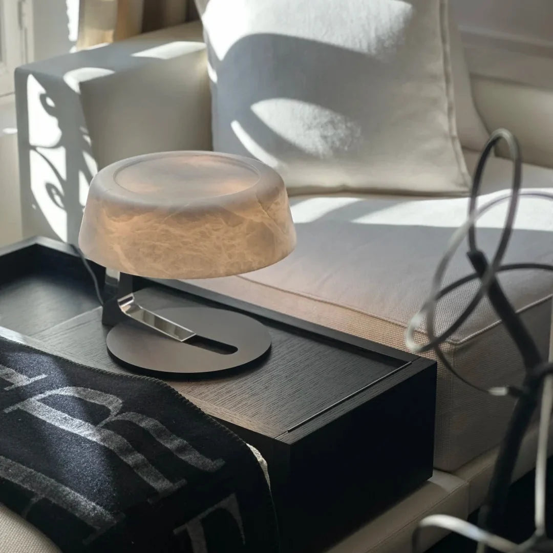 Alabaster table lamp with frosted opal shade on metal frame and black base