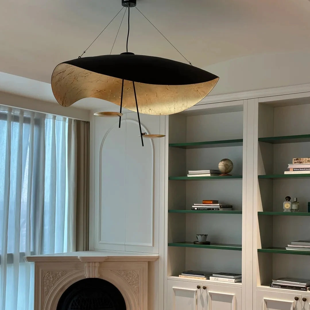 Black and gold foil disc pendant light with curved gold underside