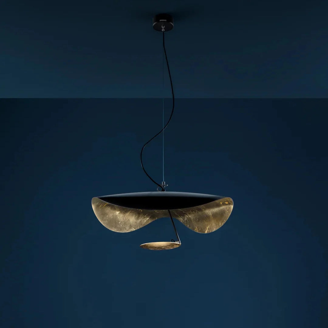 Black and gold foil disc pendant light with hanging cords and matching small disc shade