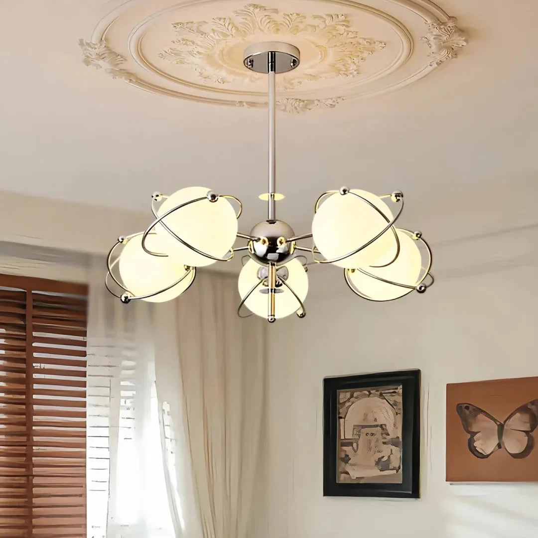 Orbit-style ceiling chandelier with chrome center and several round opal glass shades