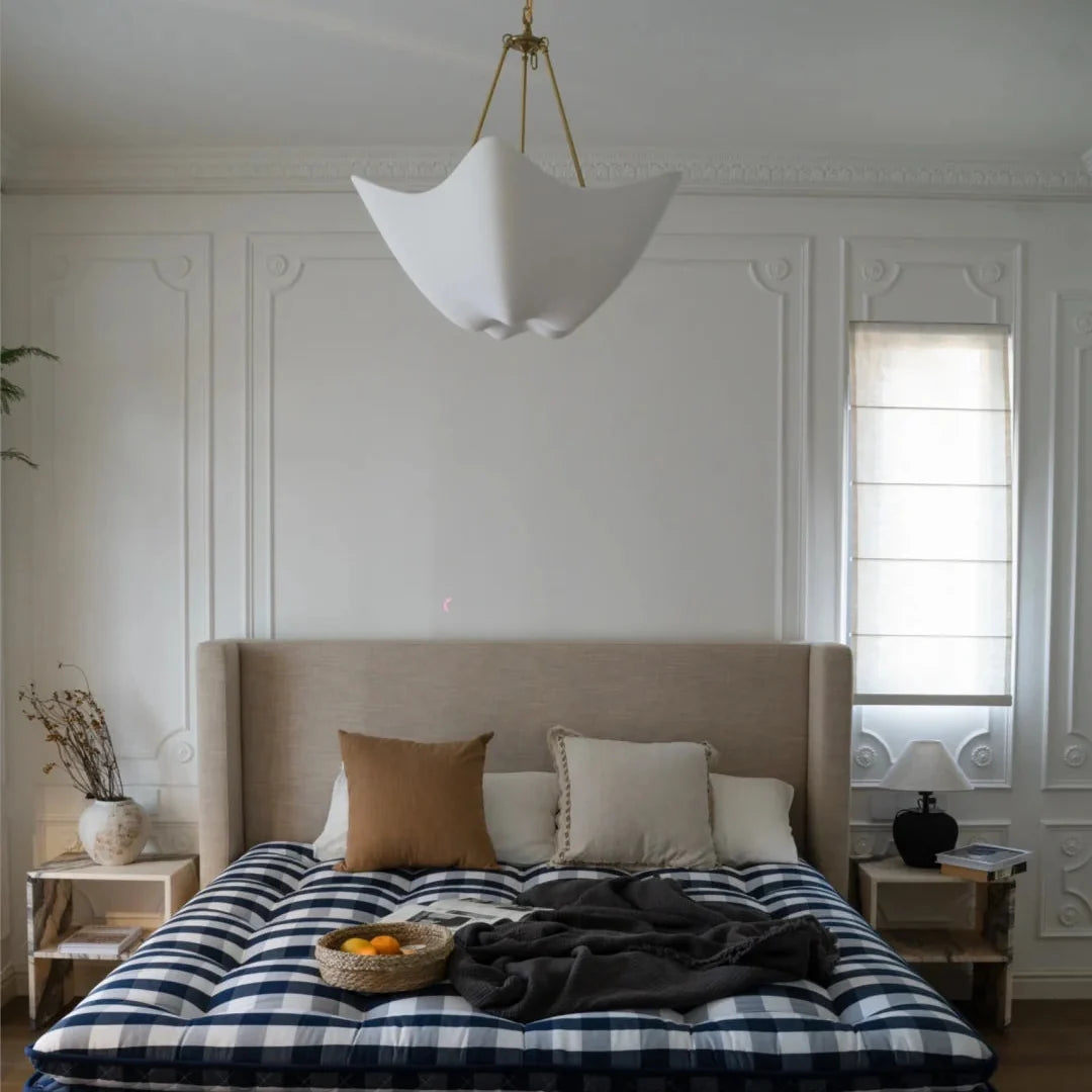 Chalk-white plaster chandelier with five petal shades and gold chain, hanging