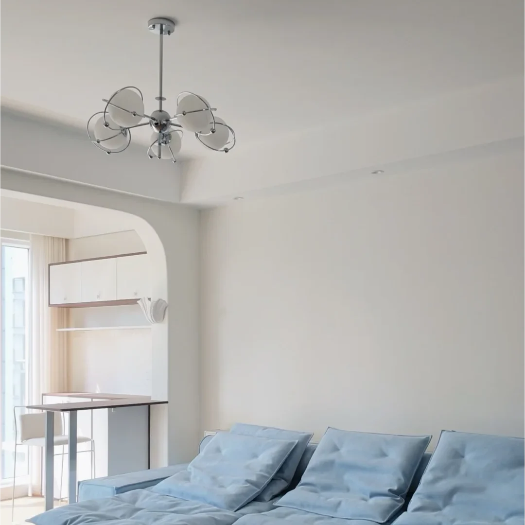 Orbit-style ceiling chandelier with chrome arms and frosted round glass shades