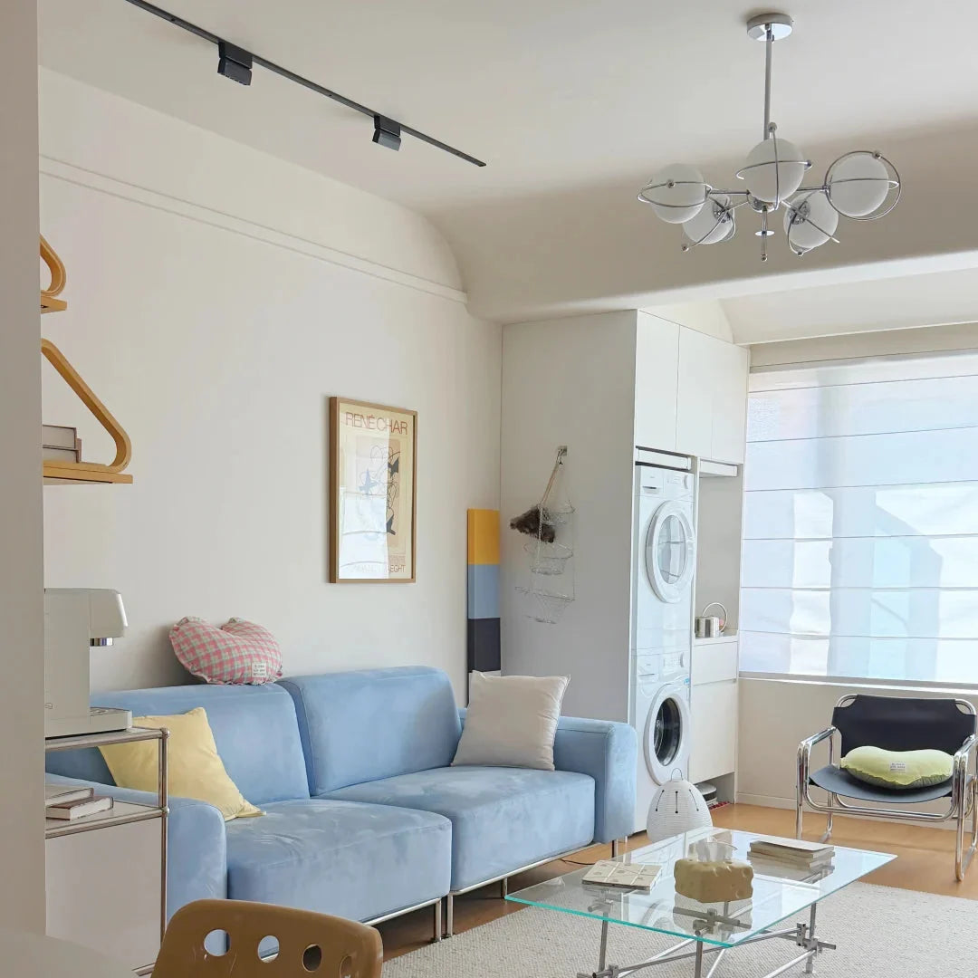 Multi-light orbit chandelier with chrome finish and frosted round glass shades