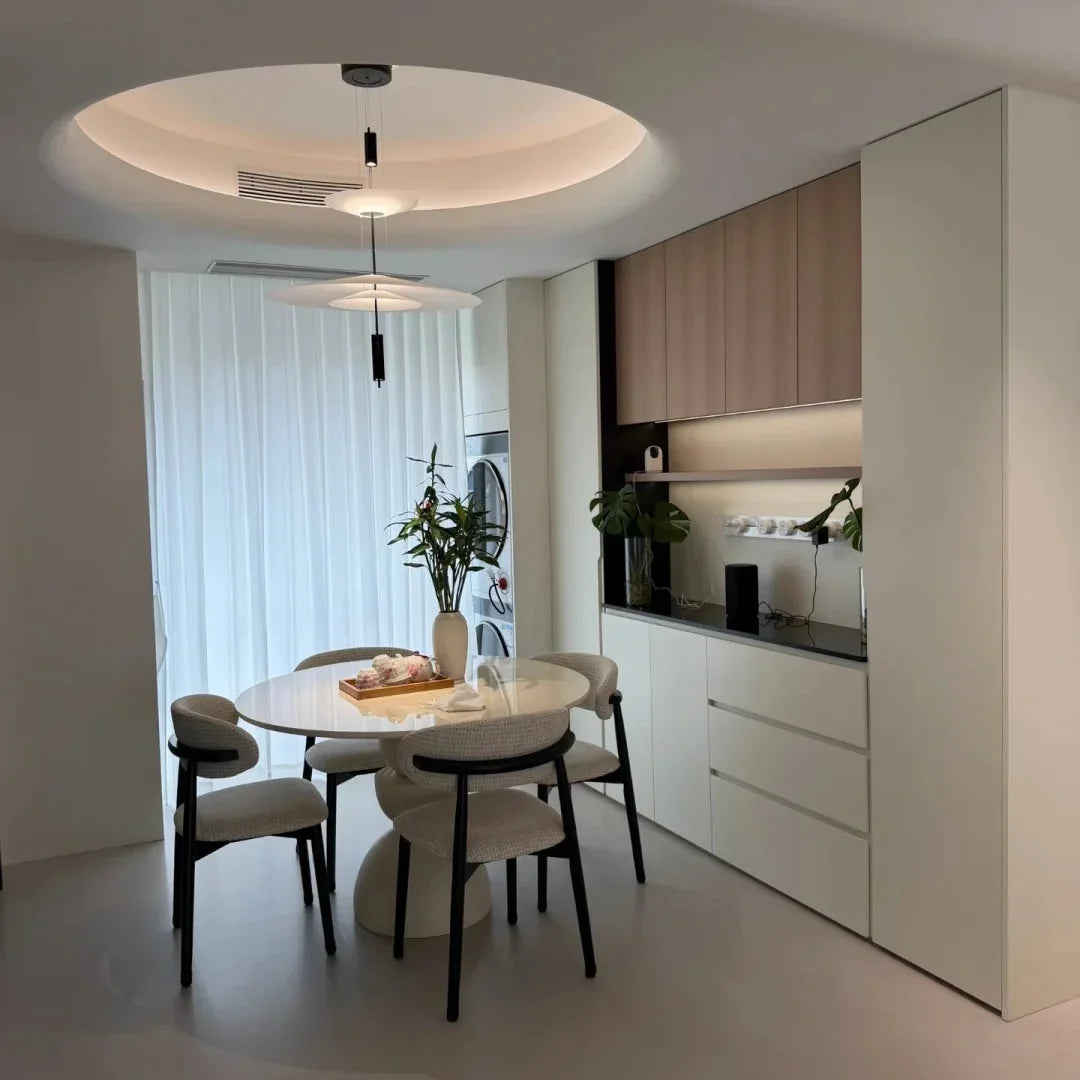Stacked disc chandelier with white disc shades and black hanging suspension