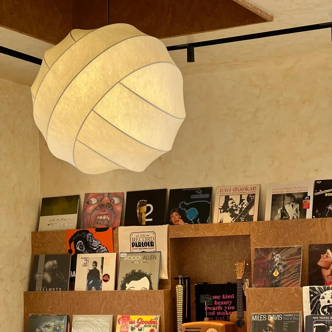 Luma silk pendant light in pale beige, pleated shade with curved edges