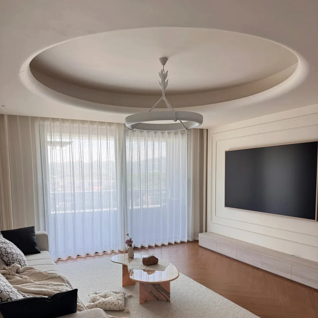 White tree-style ceiling chandelier with circular shade and central branching stem