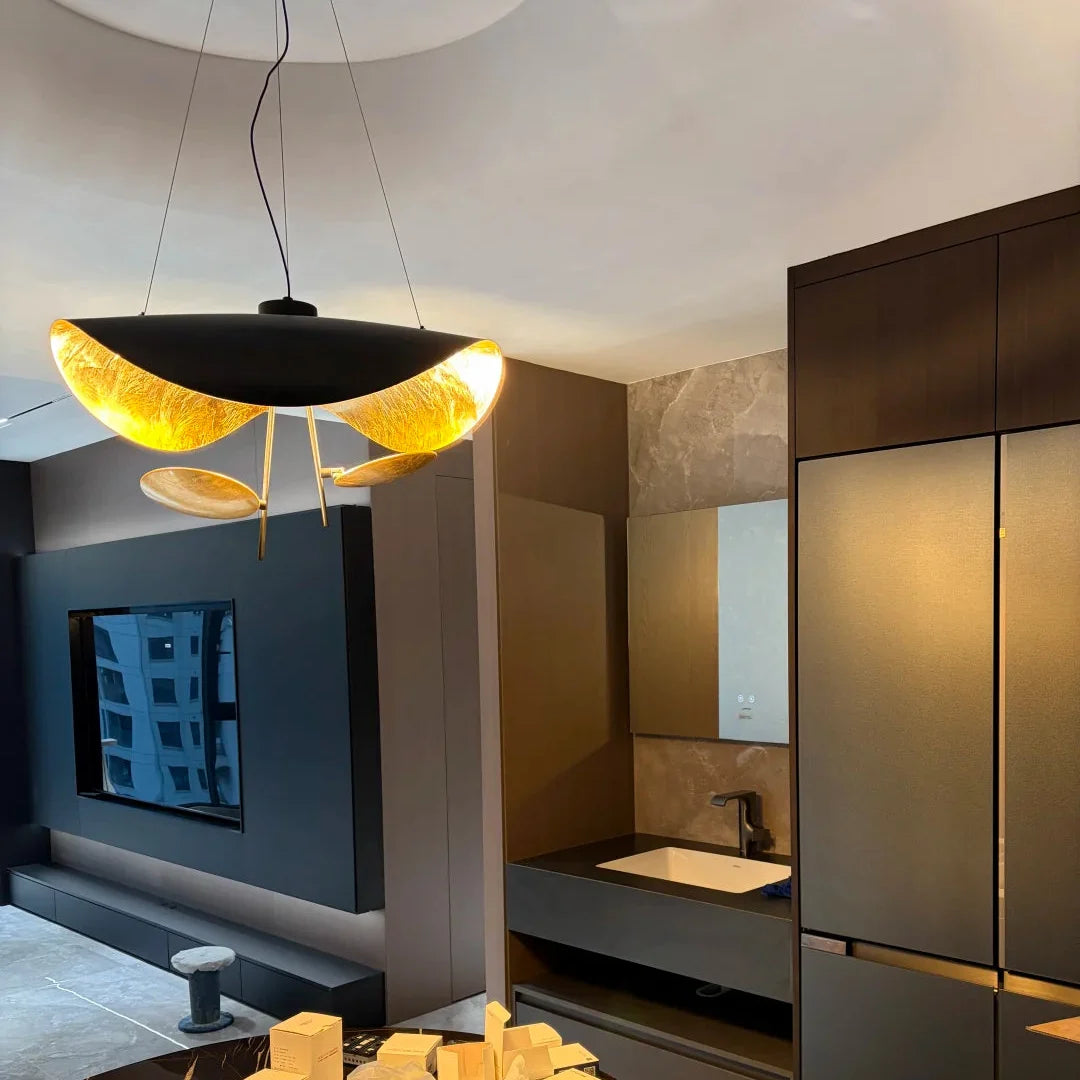 Modern black and gold foil pendant light with semicircular disc shades and central stem