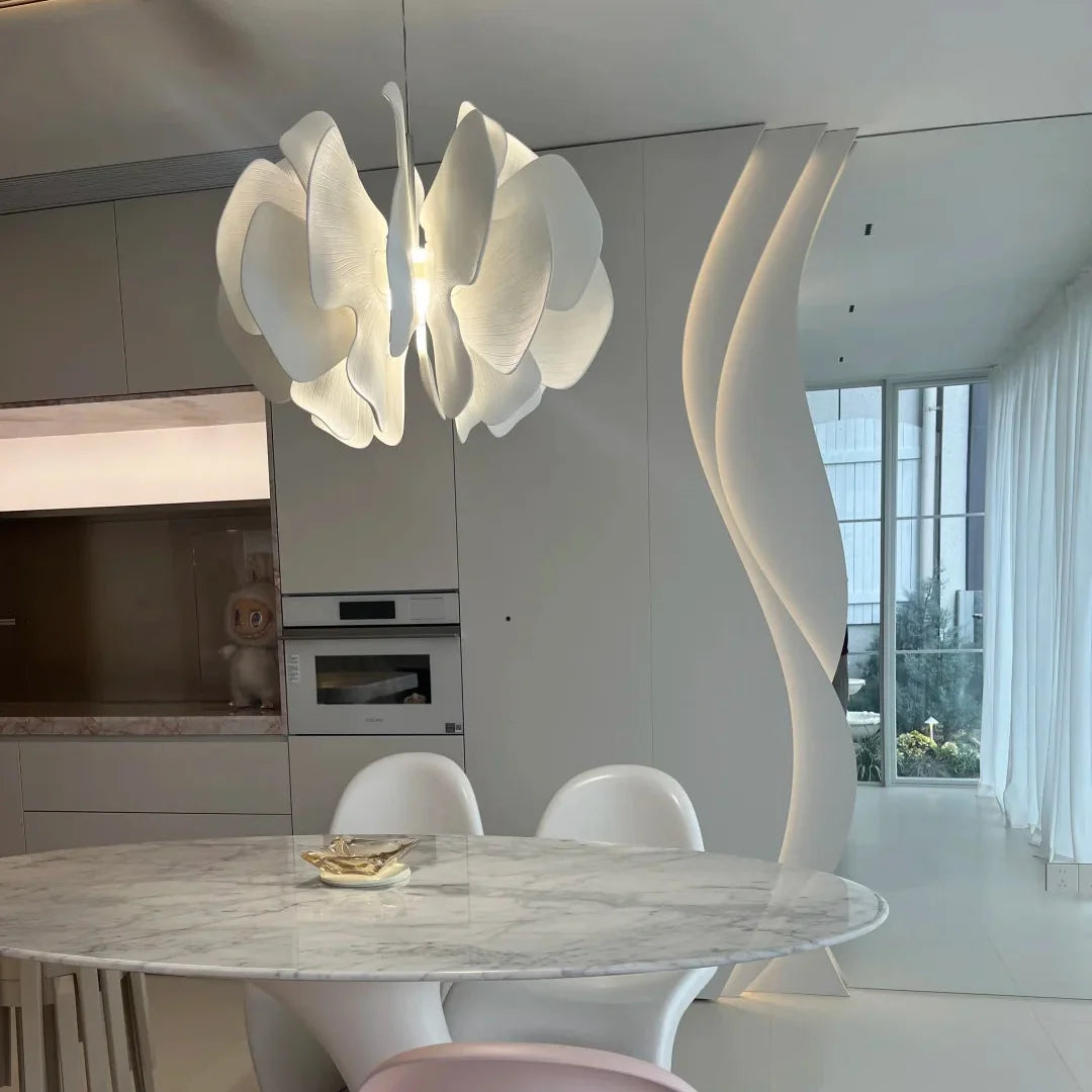 Ceramic petal chandelier with white petal shades and visible central light source