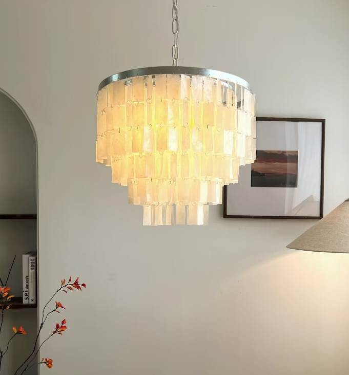 Capiz shell chandelier with circular metal rim and layered fringe