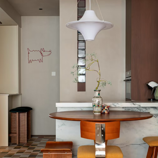 White star-shaped disc pendant light with metal suspension rod