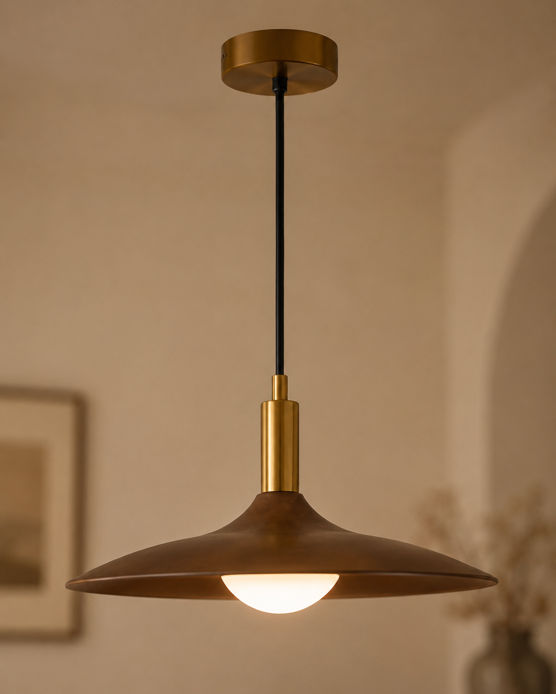 Natural materials and handcrafted details of Saucer Pendant Light