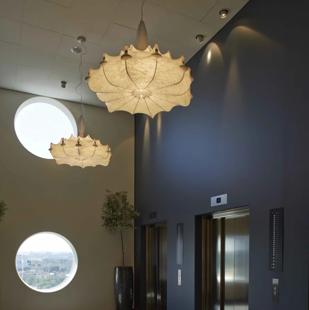 Gold-toned silk leaf chandelier with scalloped petal shape and central stem