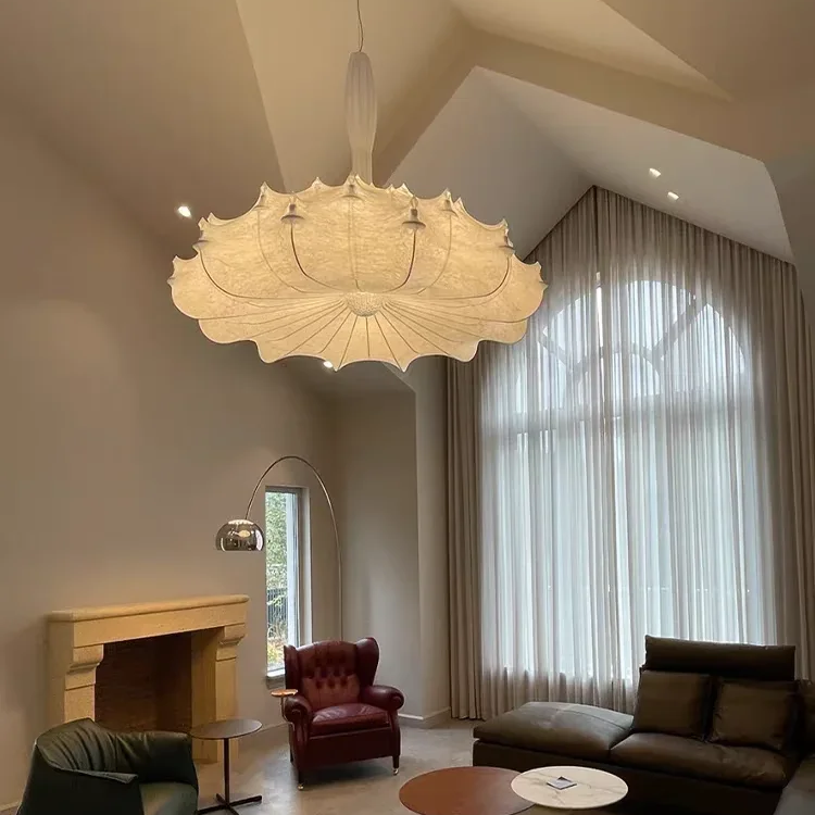 Petal-shaped fabric chandelier with scalloped shade and hanging bulb, warm beige
