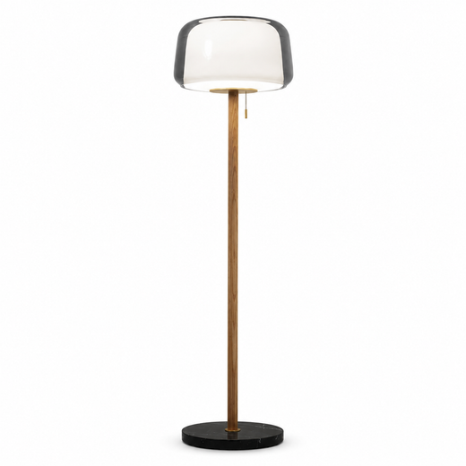 Floor lamp with smoked glass shade and tall wood column on a black round base