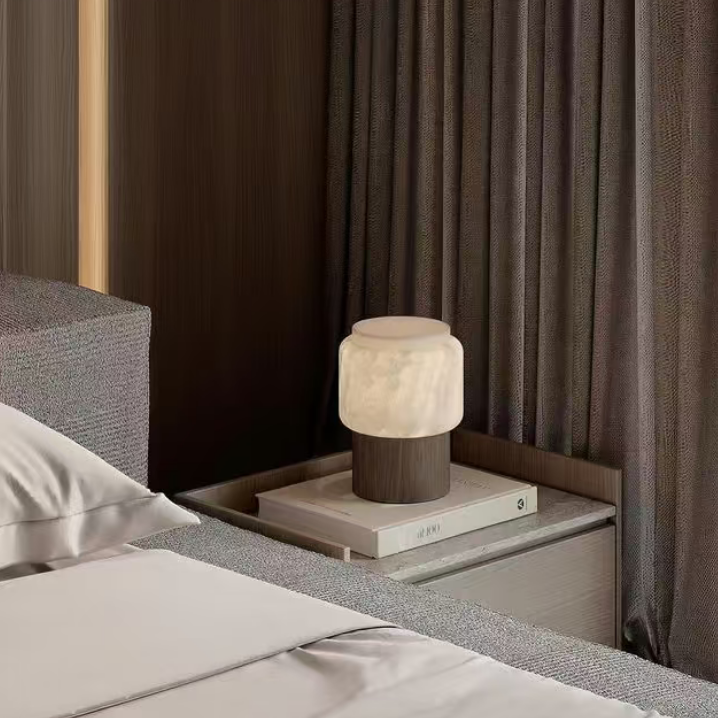 Walnut bedside table lamp with frosted white shade and dark wood base
