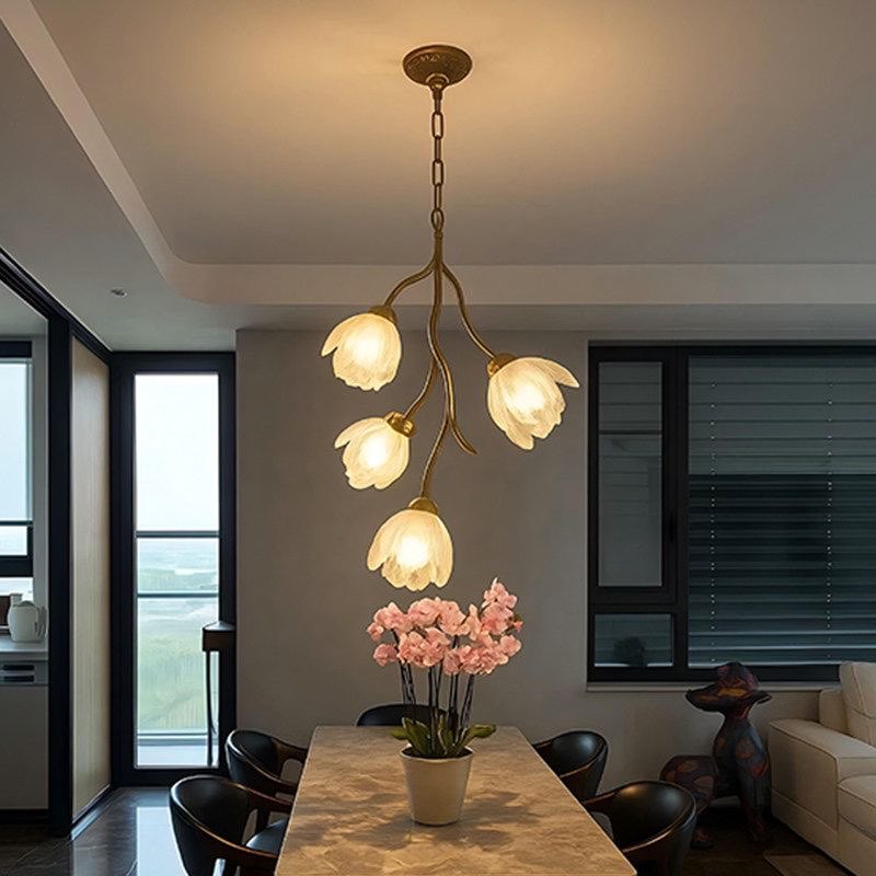 Floral branch chandelier with gold metal frame and five white frosted flower bulbs
