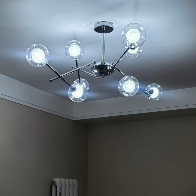Bauhaus balance globe chandelier with clear glass globes on chrome arms