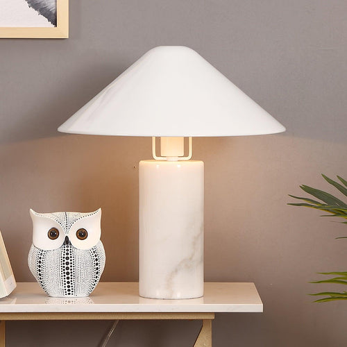 Modern table lamp with white dome shade and white marble-look cylindrical base
