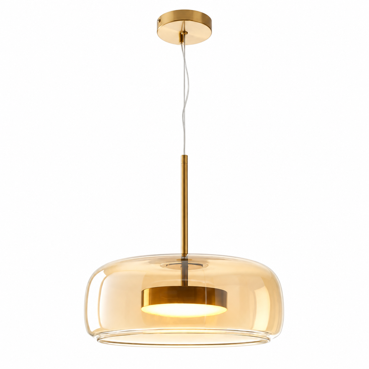 Amber glass dome pendant light with brass canopy and warm exposed bulb