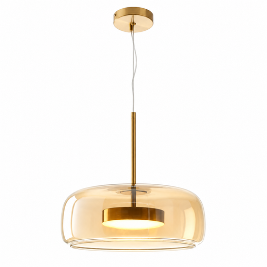 Amber glass dome pendant light with brass canopy and warm exposed bulb