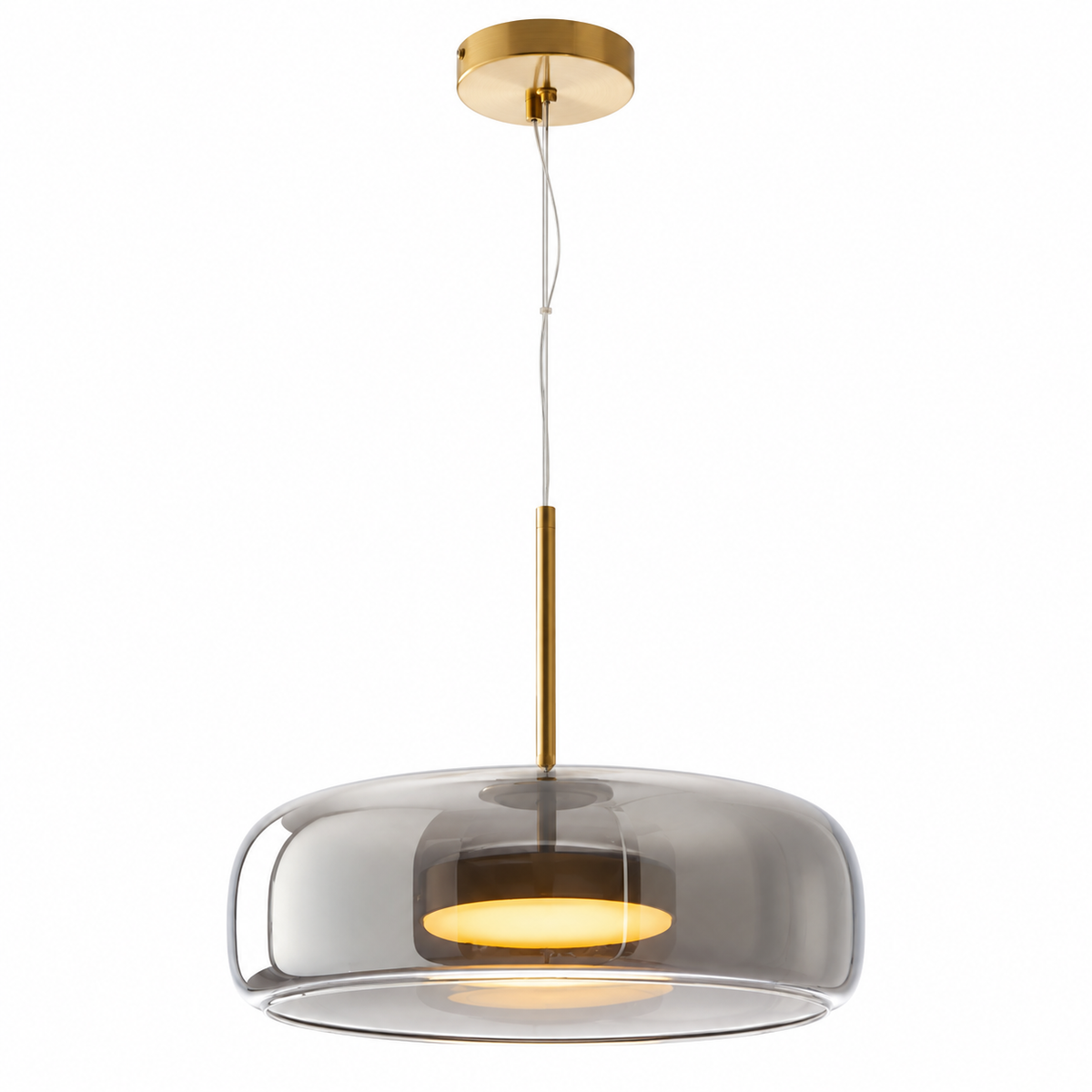 Smoky grey glass dome pendant light with brass canopy and warm bulb