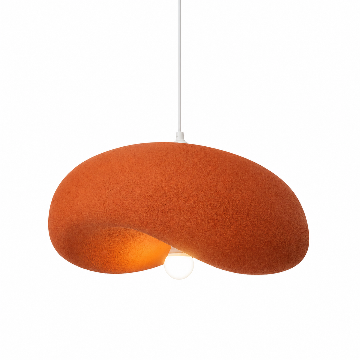 Warm coral textured disc pendant light with exposed bulb beneath the shade