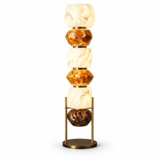Stacked resin totem floor lamp with amber and white glassy shades on a gold base