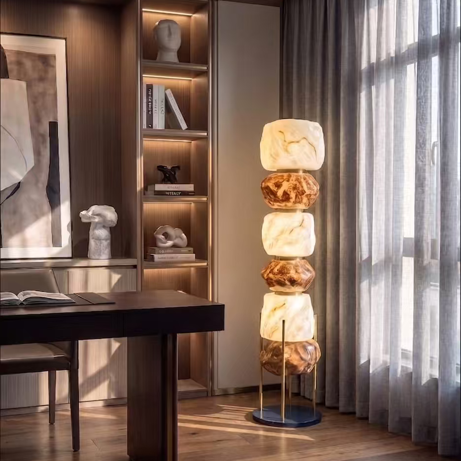 Tall stacked resin totem floor lamp with glowing white and amber resin blocks on base