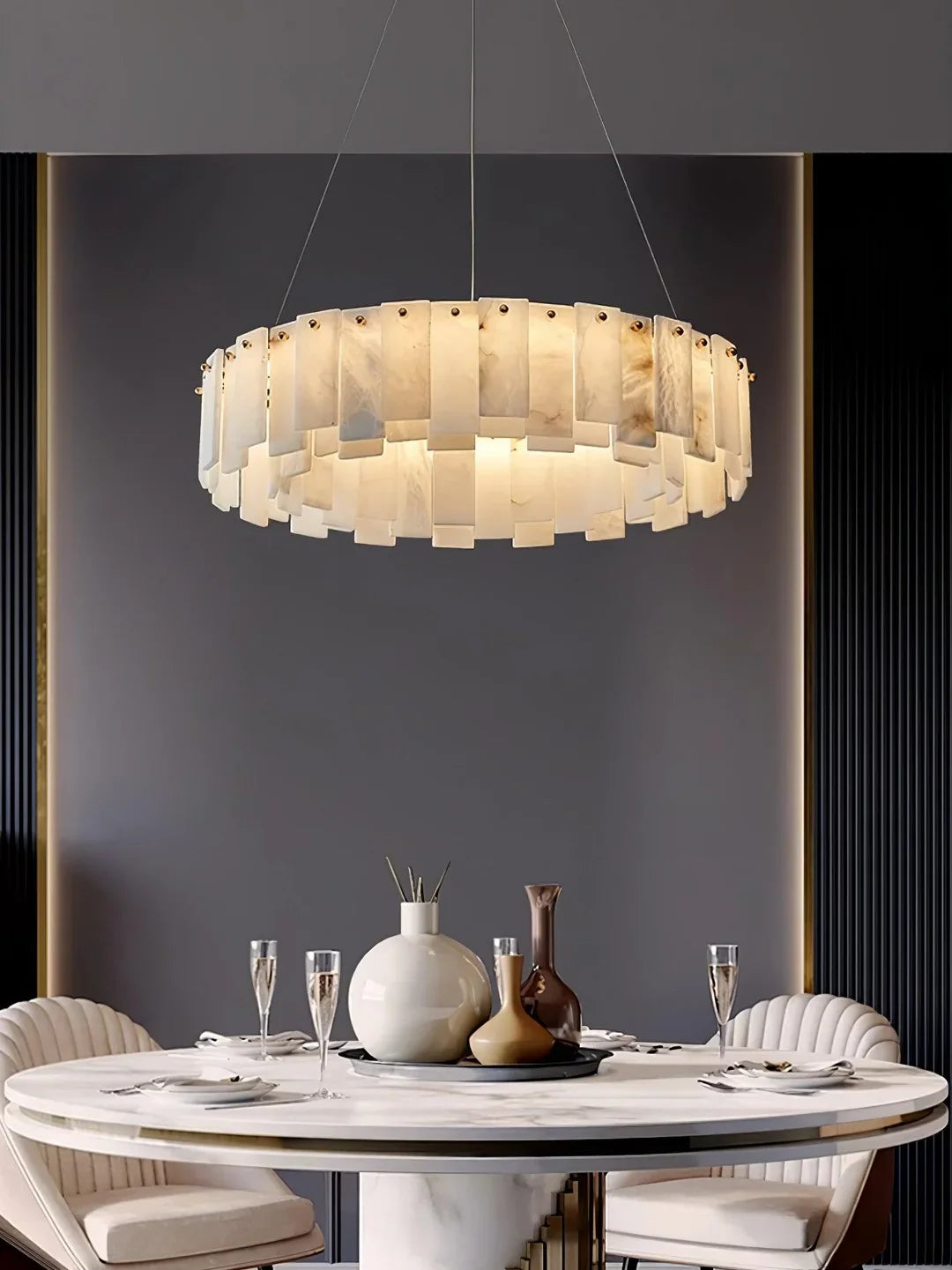 Oslo alabaster disc chandelier with a circular ring of glowing alabaster panels overhead