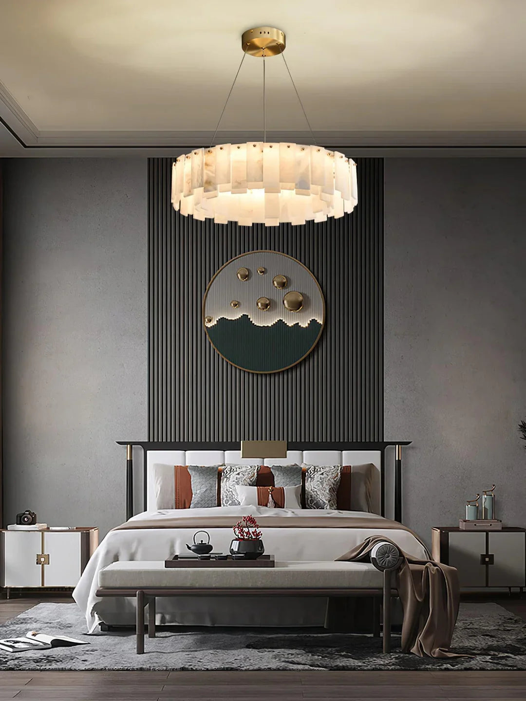Oslo alabaster disc chandelier with warm-lit alabaster panels and a brass ceiling canopy