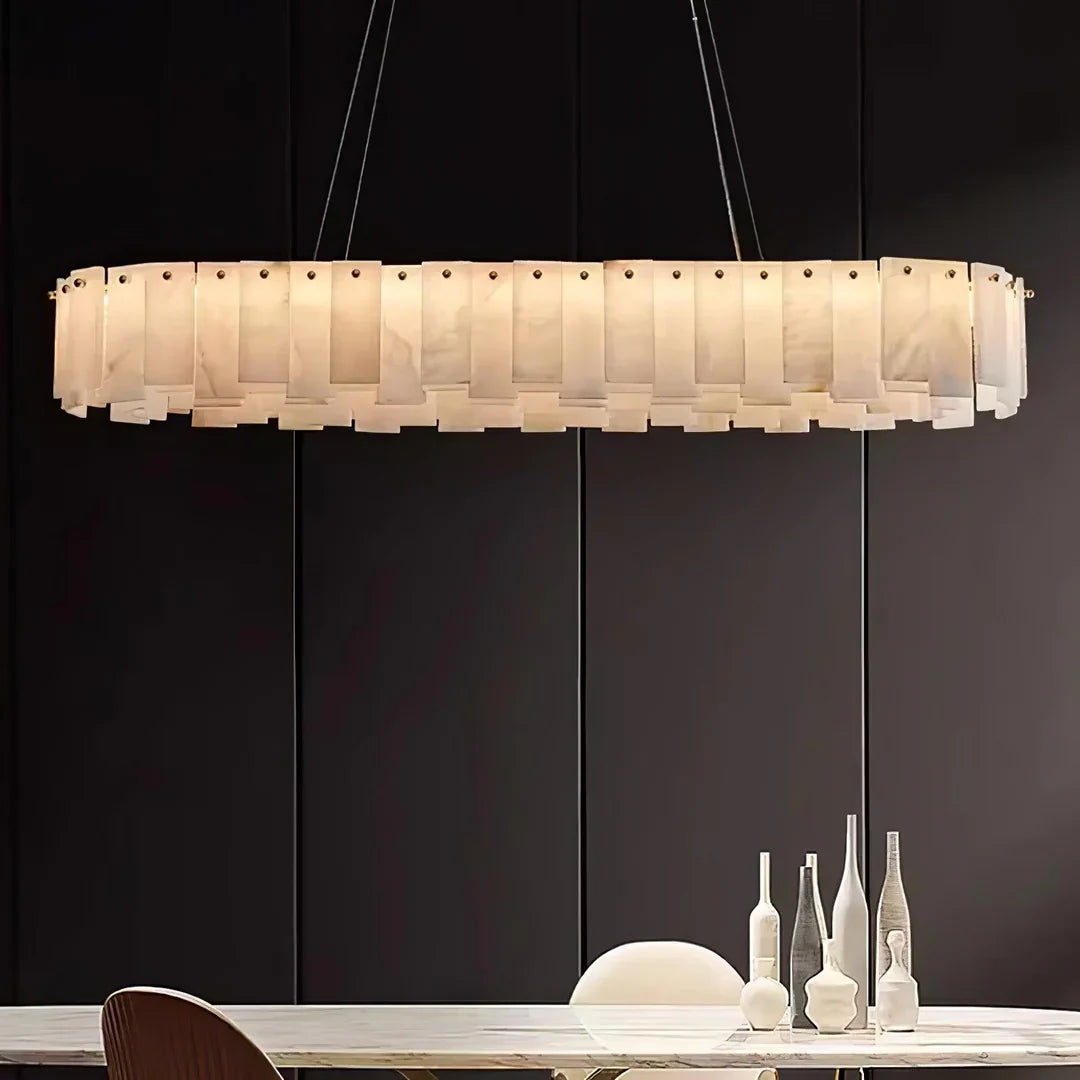 Linear disc chandelier with frosted glass panel shades and brass ceiling canopy