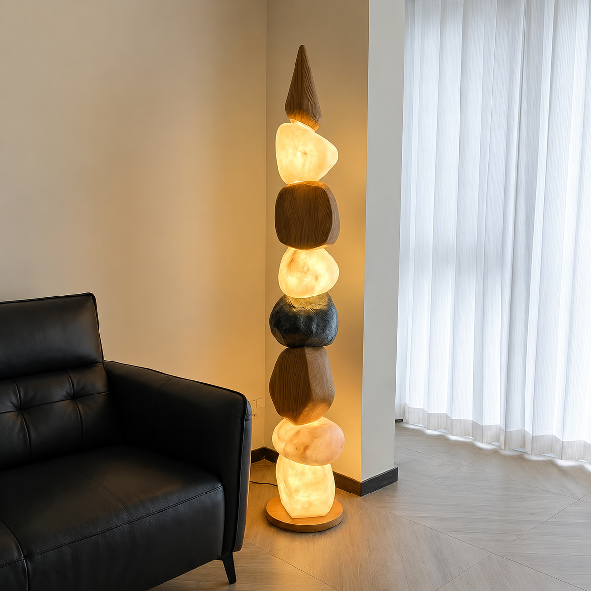 Stacked pebble floor lamp with glowing stone segments and round wooden base