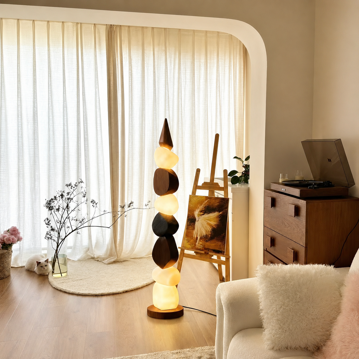 Pebble stack floor lamp with illuminated stones and sturdy round wooden base