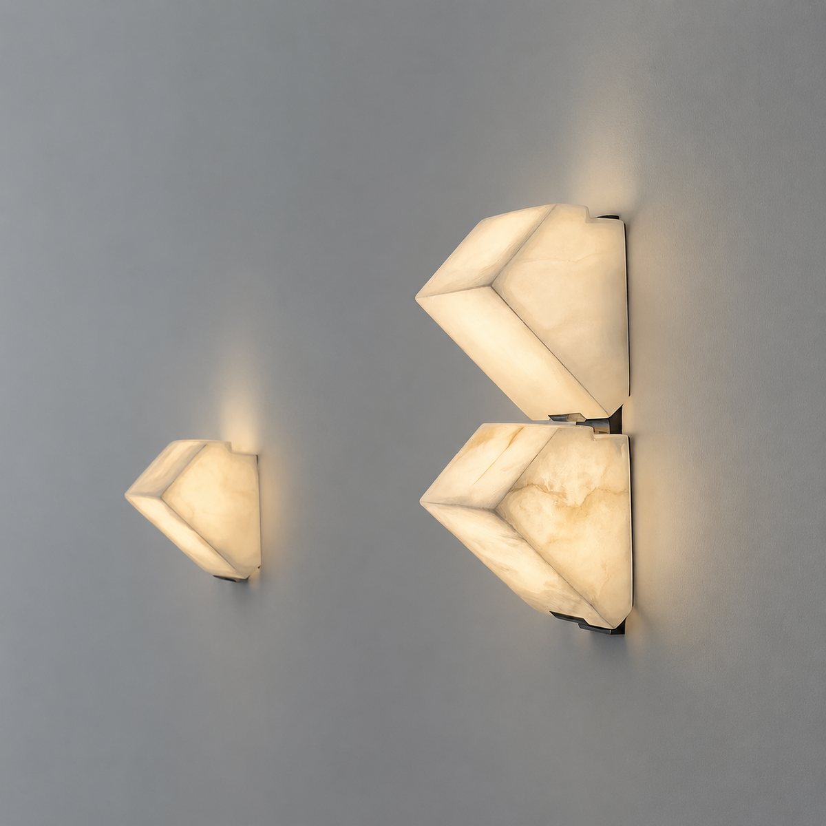 Alabaster cube wall sconce with three stacked shades