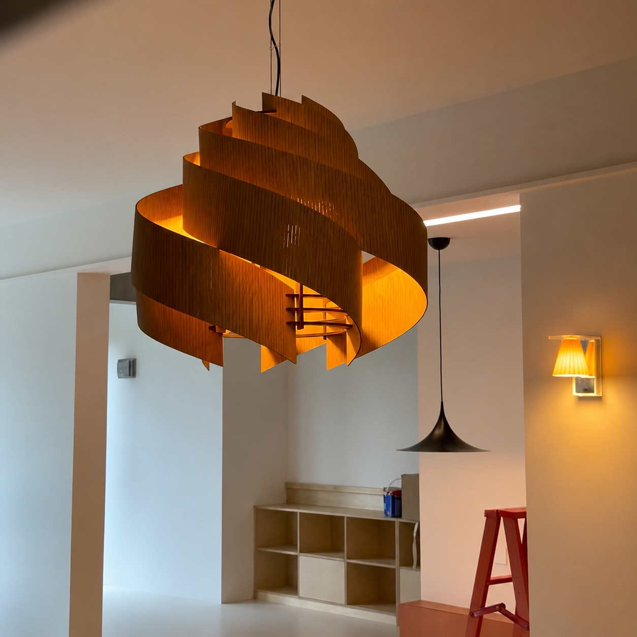 Natural wood spiral pendant chandelier with layered curved slats emitting warm light