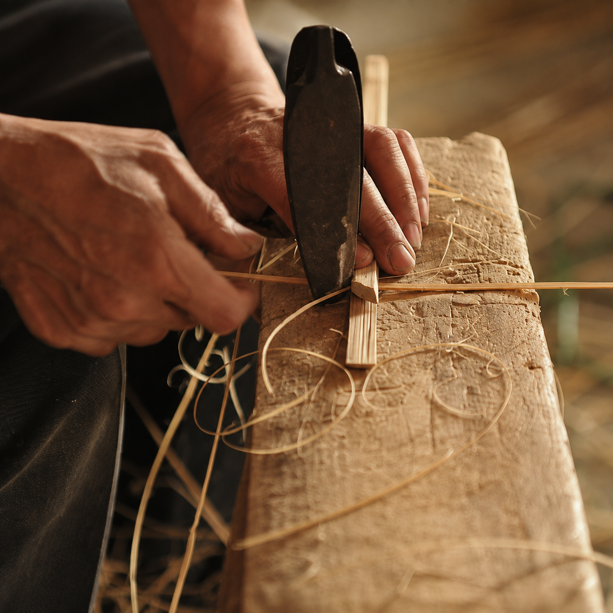 Raffia Tiered Disc Pendant Light styled in a warm natural interior
